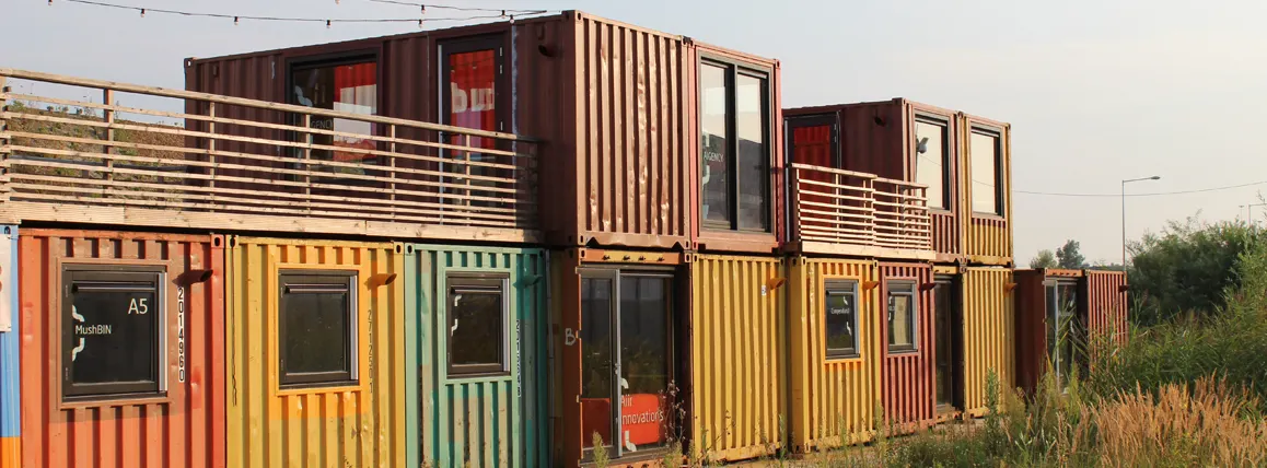 Stacked shipping container apartment building