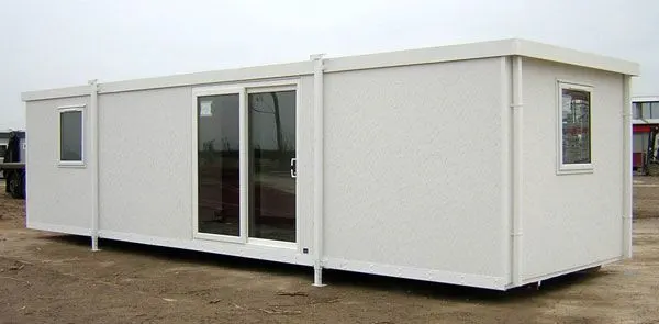 Stacked container homes painted in bright colours
